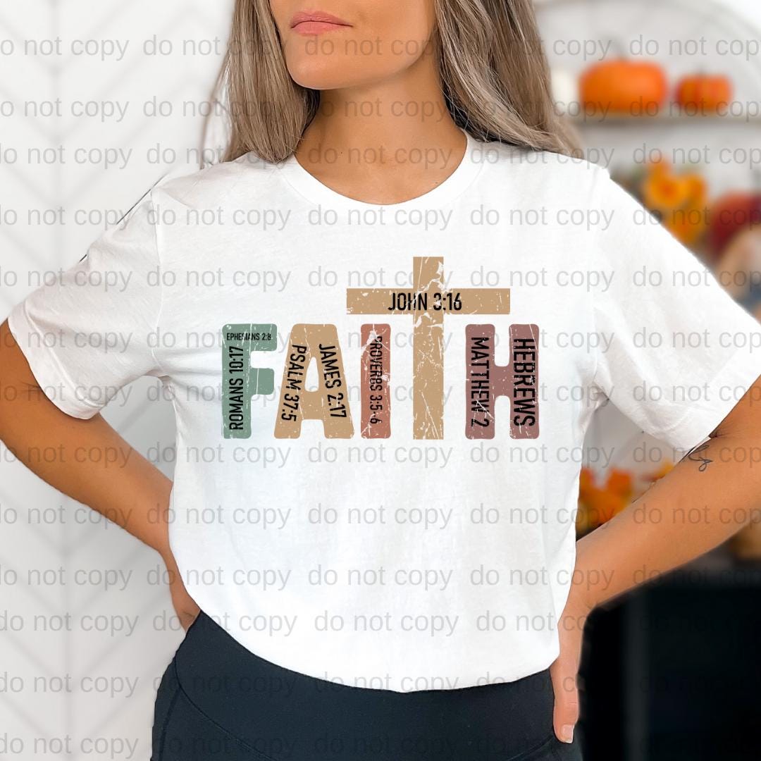 A woman wearing a white t-shirt with a graphic design featuring the text "FAITH" in a distressed font, along with various Bible verse references such as "JESUS 3:16", "RITA", "JAMES 5:5", "HELVES 2", "MATTERS 2", and "HELVES 2".
