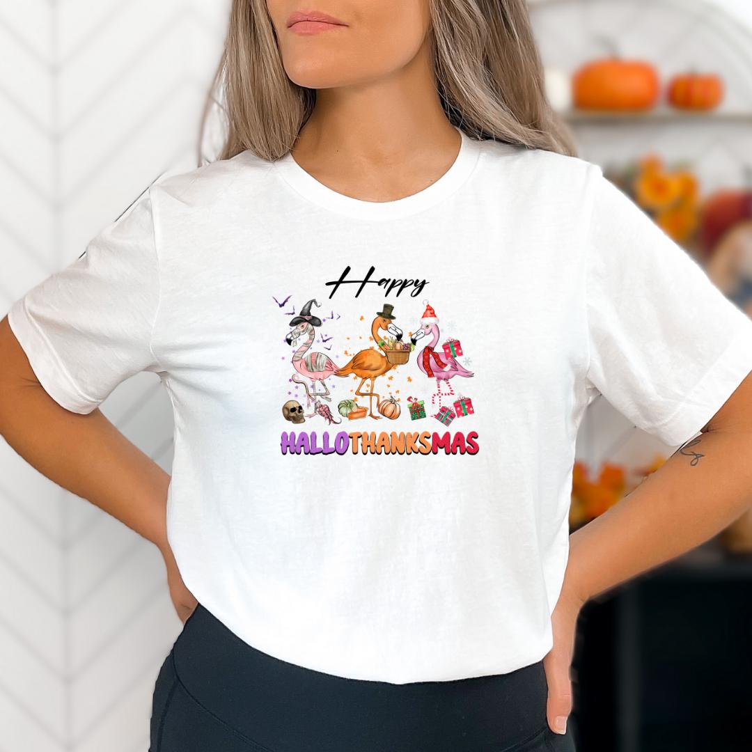 A woman wearing a white t-shirt with a colorful graphic design featuring a cartoon character and text.